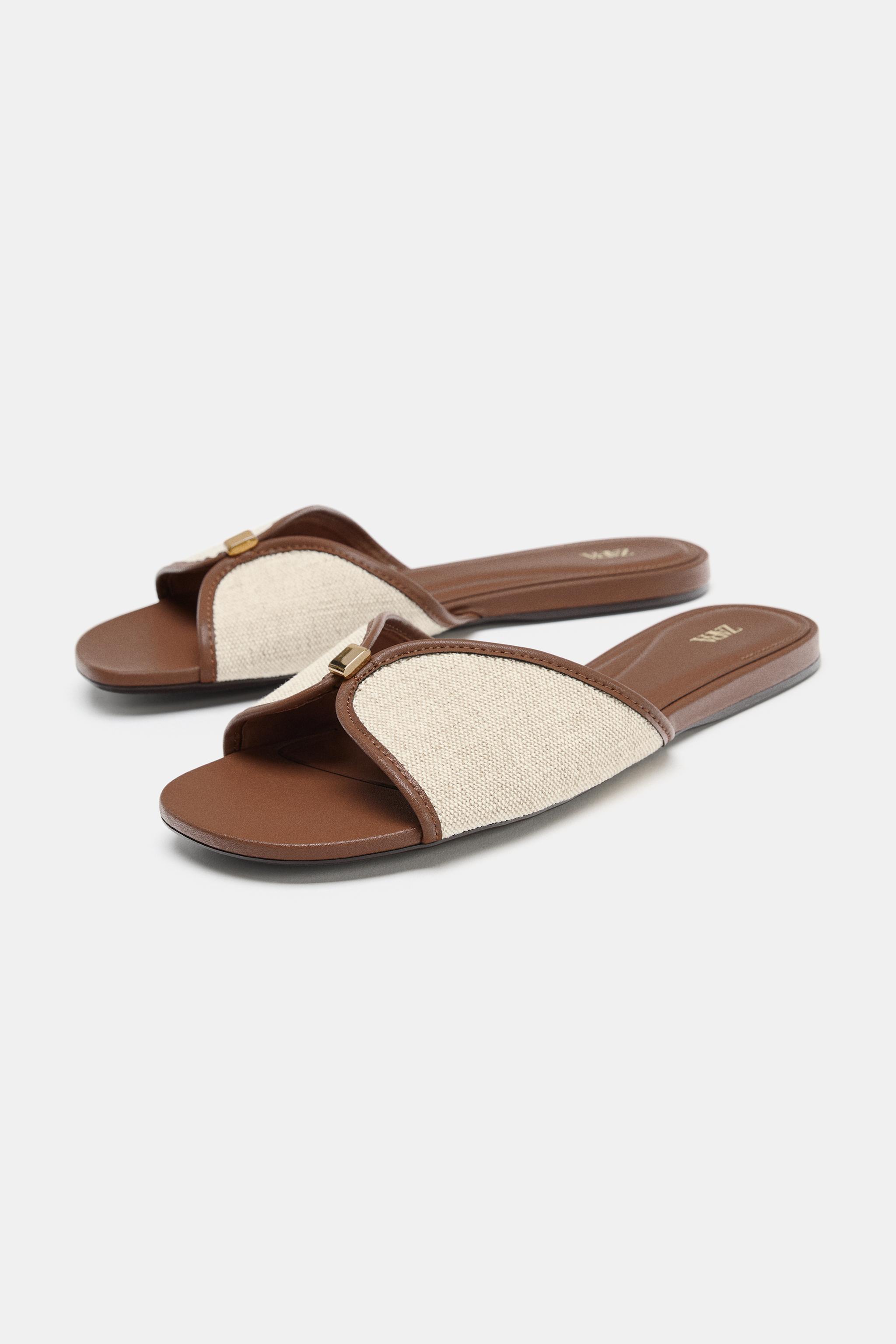 FLAT SANDALS WITH METAL DETAIL